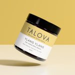 Talova Ylang Ylang whipped tallow balm jar on a yellow background